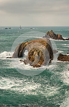 The arch of Enys Dodnan, Land`s End, Cornwall.