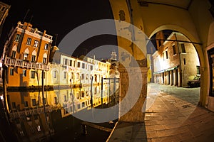 Arch on house and canal Vena. Chioggia photo