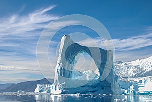 Arch iceberg in Greenland photo