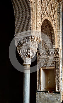 Arch with moresque ornaments in 16th century castle. Alhambra, Granada, Spain.