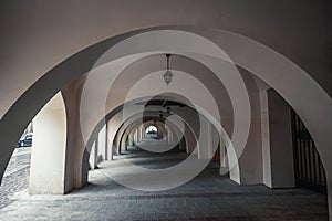 Arch passage, arched corridor street in Krakow, Poland