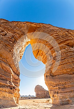Arch of sandstone elephant rock erosion monolith standing in the desert, Al Ula, Saudi Arabia photo