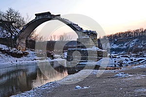 Arch, the span, the old destroyed stone bridge