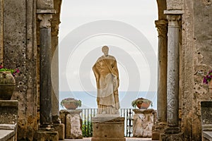 Arch with a statue at the entrance to the Terrace of Infinity or Terrazza dell`Infinito, Villa Cimbrone, Ravello  village, Amalfi photo