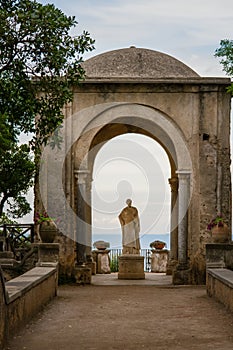 Arch with a statue at the entrance to the Terrace of Infinity or Terrazza dell`Infinito, Villa Cimbrone, Ravello  village, Amalfi photo