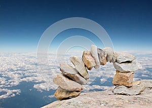 Arch of stones with aerial sky view background