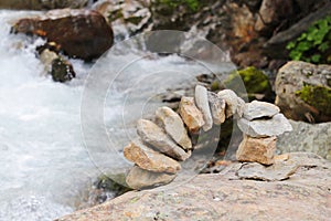 Arch of stones with river background