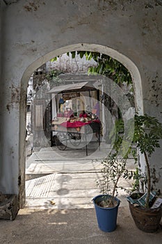 Arch on the street in the old town of Takua Pa. Fragments of Sino-Portuguese architecture in Thailand, street photo