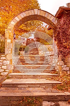 Arch and street view in Portaria village of Pelion, Greece