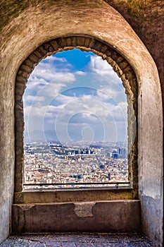 Arch view to the city from ancient castle in Naples, Italy