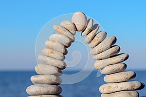 Arch of white pebbles