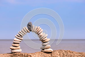 Arch of white pebbles