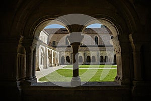 The archade of the fontenay abbey on the town of Montbard photo