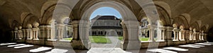 The archade of the fontenay abbey on the town of Montbard photo