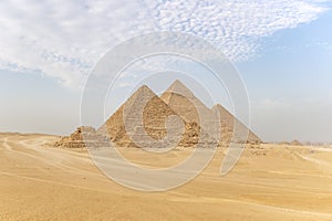 Archaeological complex of Great Egyptian Pyramids is located on the Giza plateau. Pyramids of Chephren Khafra and Cheops Khufu and