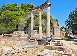 Ruins at the site of ancient Olympia in Greece photo