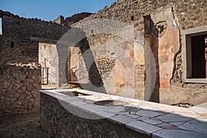 Archaeological park of Pompeii. An ancient city that tragically perished under lava. Old dilapidated houses, villas. Internal