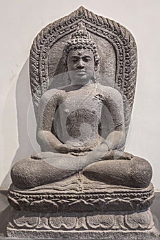 Archaeological sandstone statue of Gautam Buddha in meditation