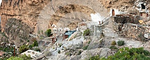 Archaeological site with cave houses on the cliff of Acusa Seca on the island of Gran Canaria, Spain