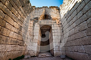 The archaeological site of Mycenae near the village of Mykines, with ancient tombs, giant walls and the famous lions gate.