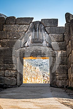 The archaeological site of Mycenae near the village of Mykines, with ancient tombs, giant walls and the famous lions gate.