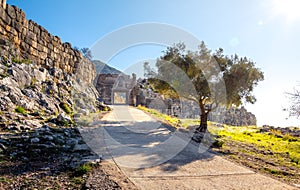 The archaeological site of Mycenae near the village of Mykines, with ancient tombs, giant walls and the famous lions gate.
