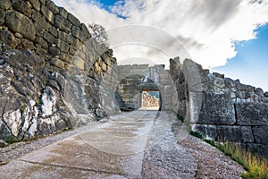 The archaeological site of Mycenae near the village of Mykines, with ancient tombs, giant walls and the famous lions gate.