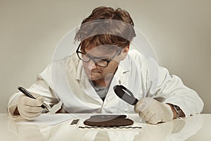 Archaeologist researcher taking samples of cuneiform material