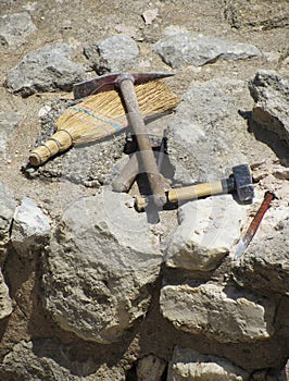 Archaeologist tools on excavation site