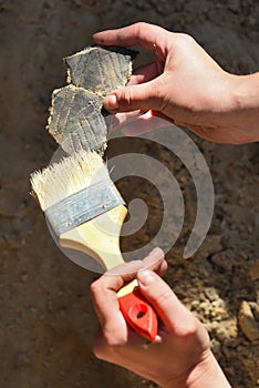 Archaeology: cleaning finds photo