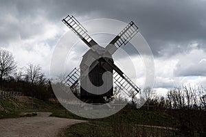 An archaic , reconstructed BockwindmÃ¼hle  windmill  from 1729