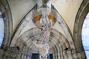 Archangel Michael on entrance portal of parish Church Saint Michael, Schwabisch Hall, Baden-Wuerttemberg, Germany