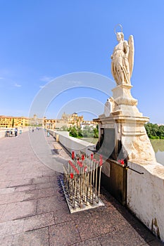 Archangel Raphael statue on bridge at Cordoba Spain - photo