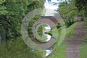 An arched bridge on the Grand Union Canal at Lapworth in Warwickshire, England