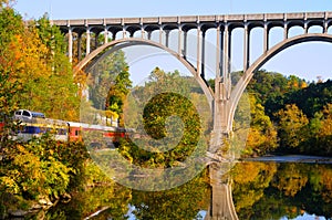 Arched bridge and passenger train