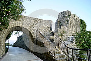 Arched bridge and remains of the Citadel fortress in the Montenegrin city of Herceg Novi