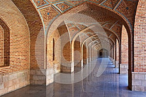 Arched corridor in the courtyard of Blue Mosque or Masjed Kabud , Tabriz , Iran