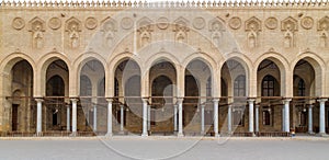 Arched corridor surrounding the courtyard of public historic Moaayad mosque, Cairo, Egypt