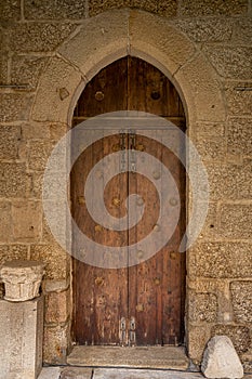 Arched door inside historic monastery in Guimaraes