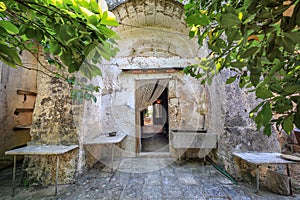 Antique abandoned farmhouse country house arched entrance photo