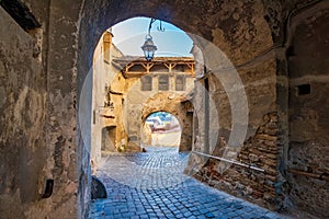 Arched entryway into old fortress, Sighisoara, Romania. UNESCO World Heritage Site