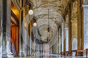 Arched gallery of National Library of St Mark or Biblioteca Nazionale Marciana on Piazza San Marco square, Venice Italy