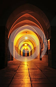 Arched hallway night