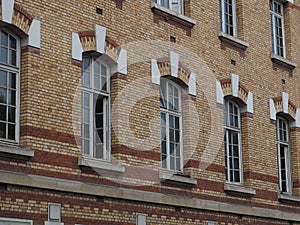 Arched lintels with white painted keystones and supporting abutme