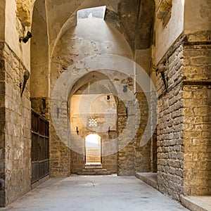 Arched passage in old stone building