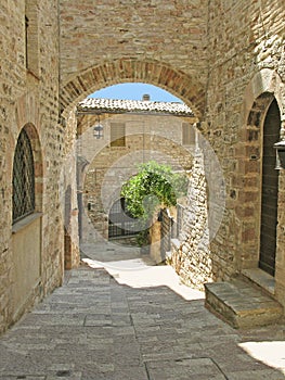 Arched passageway in Tuscany photo