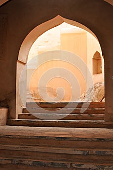 Arched stairway entrance photo