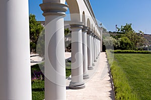 Arched structure with columns backyard architecture.