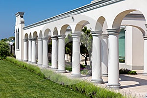 Arched structure with columns backyard architecture.