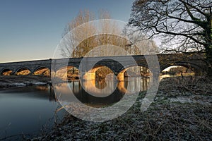 The arched Weetmans Bridge over the River Trent at Little Haywood, Staffordshire